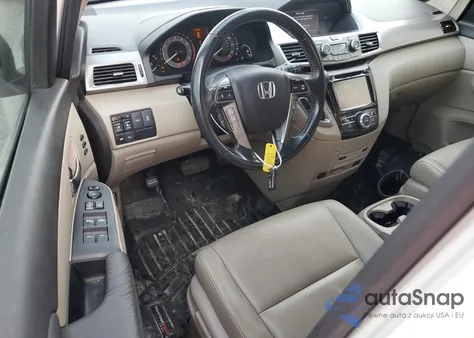 2016 Honda Odyssey Touring z USA, uszkodzony, nr VIN 5FNRL5H98GB080139